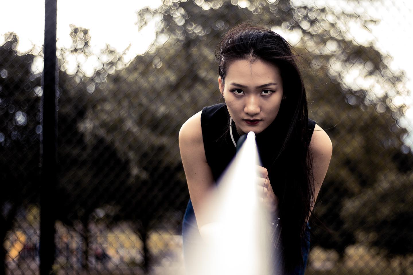 Iris in a focused, intense stance outdoors